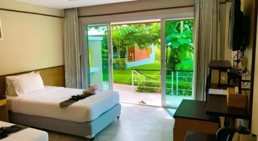 Bed in Nopparat Garden Hotel