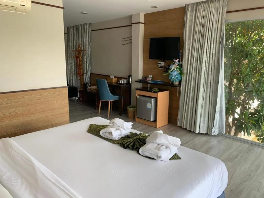 Bed in Nopparat Garden Hotel