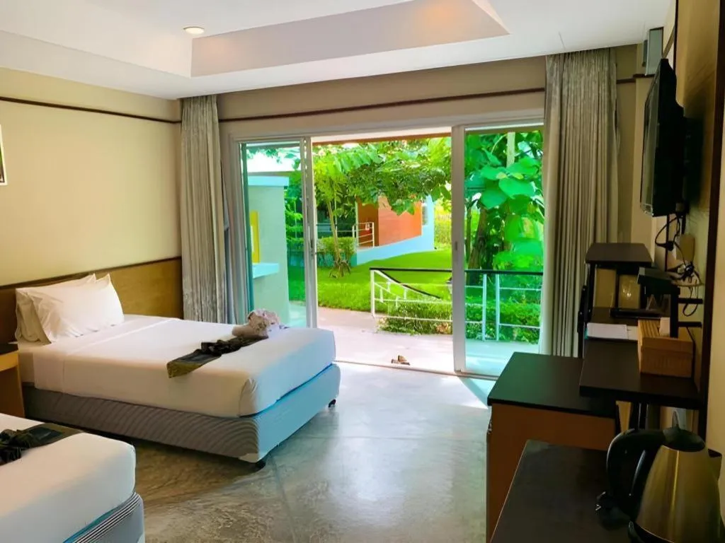 Bed in Nopparat Garden Hotel