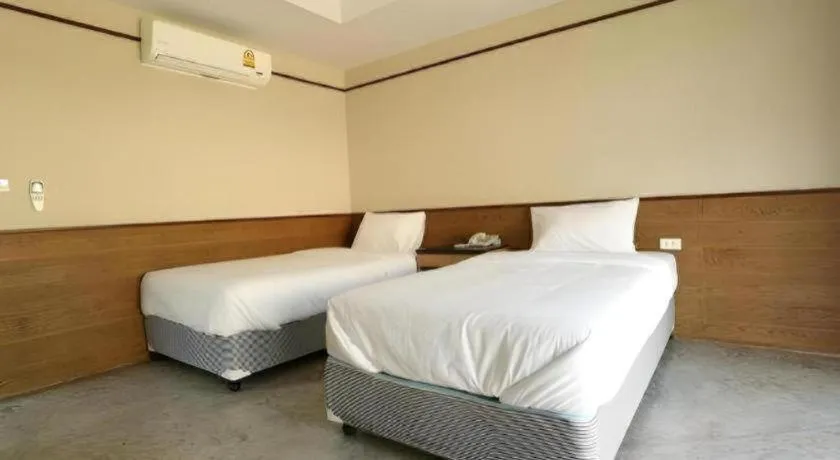 Bed in Nopparat Garden Hotel