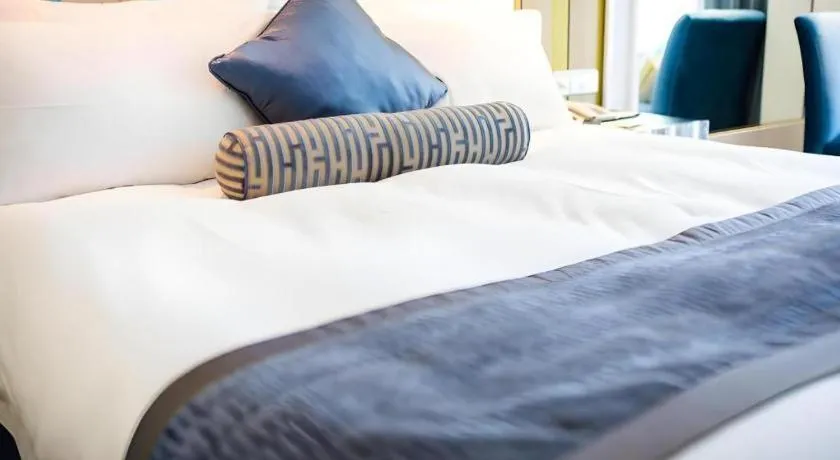 Bed in Wuyang Holiday Hotel Hangzhou