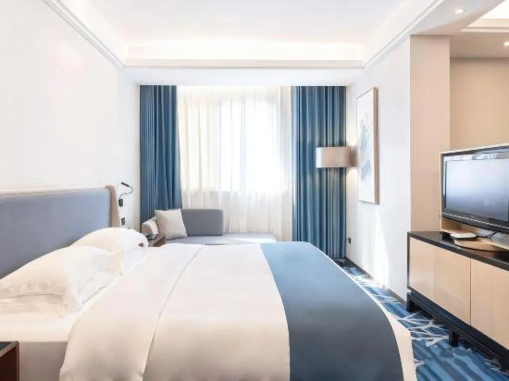 Bed in Nanning Yongjiang Hotel