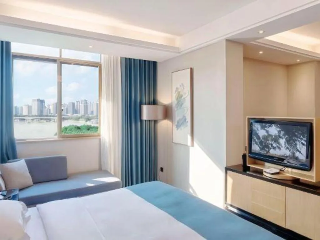 Bed in Nanning Yongjiang Hotel