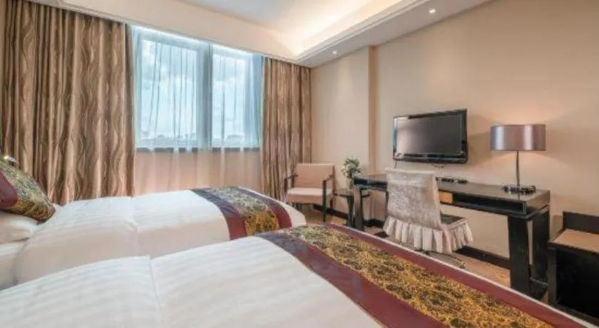 Bed in Nanning Yongjiang Hotel