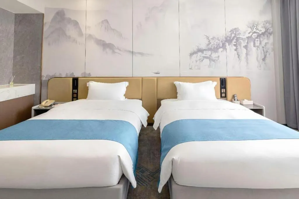 Bed in Nanning Yongjiang Hotel