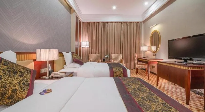 Bed in Nanning Yongjiang Hotel