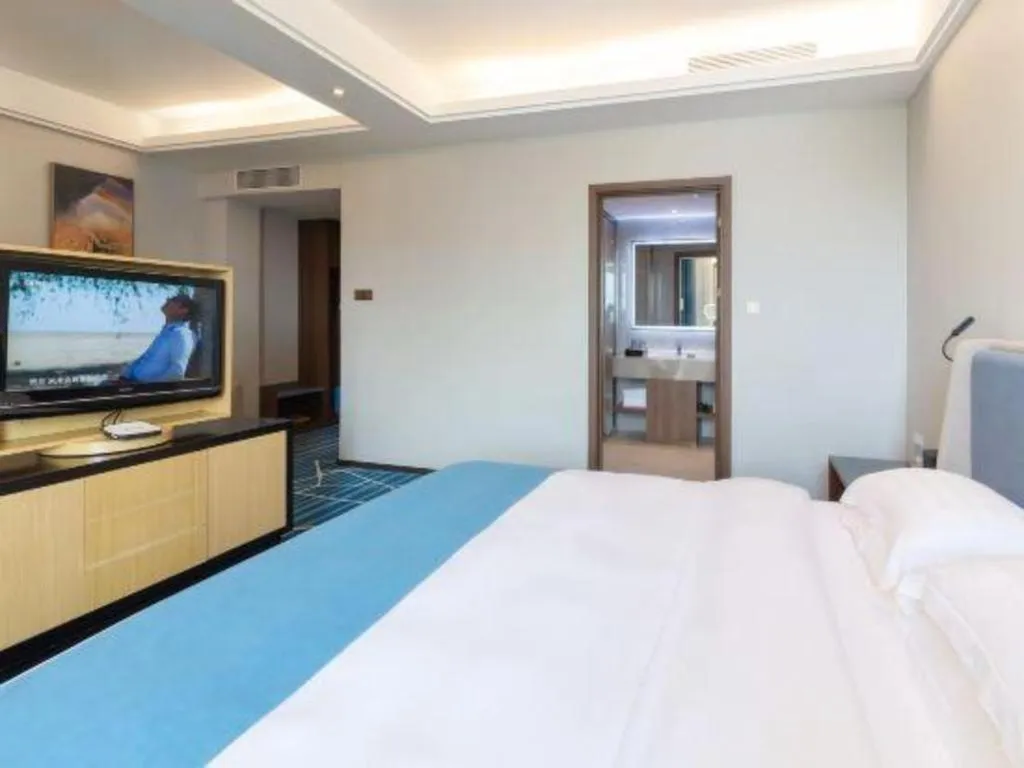 Bed in Nanning Yongjiang Hotel