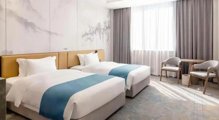 Bed in Nanning Yongjiang Hotel