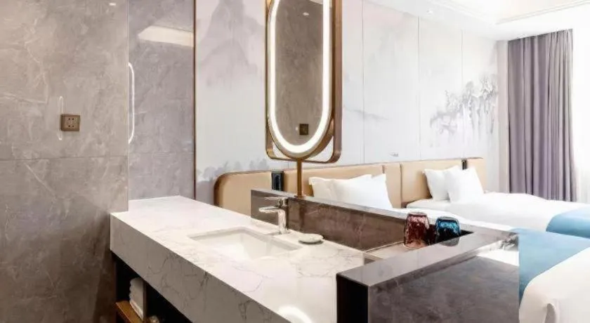 Bed in Nanning Yongjiang Hotel