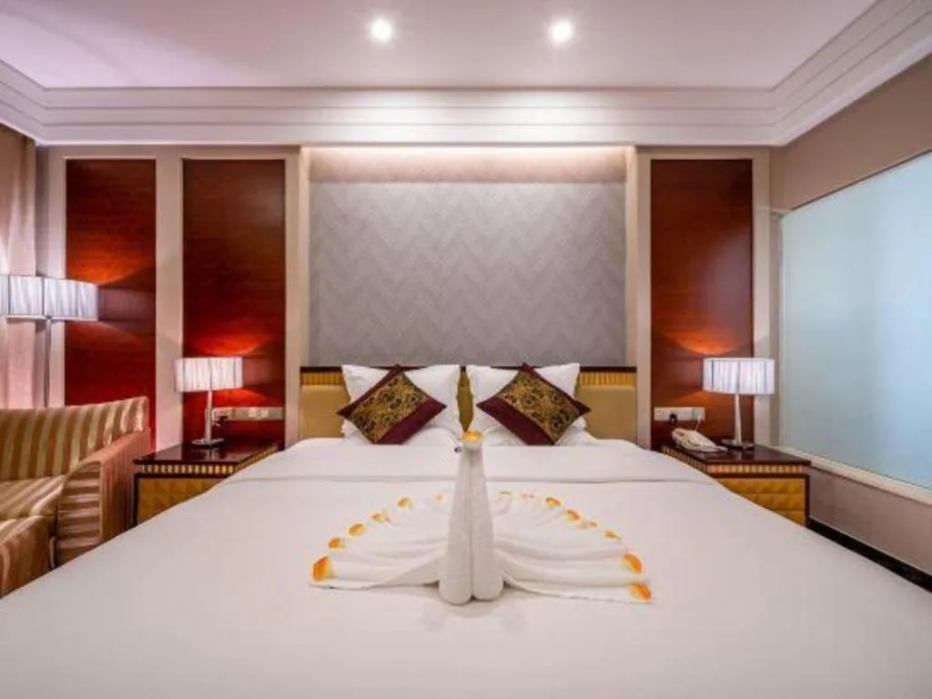 Bed in Nanning Yongjiang Hotel