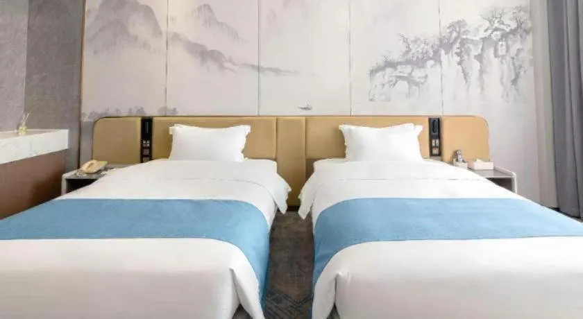 Bed in Nanning Yongjiang Hotel