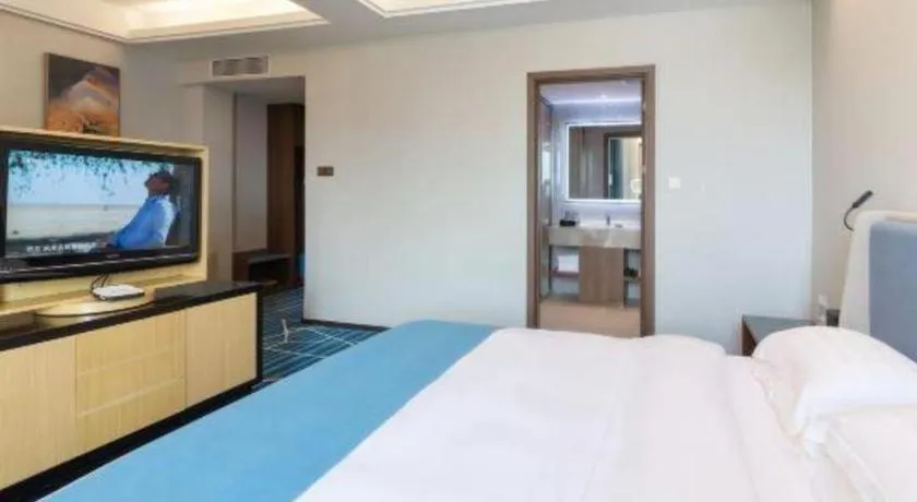 Bed in Nanning Yongjiang Hotel