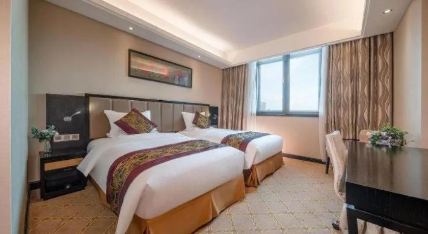 Bed in Nanning Yongjiang Hotel