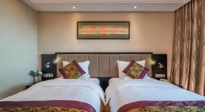 Bed in Nanning Yongjiang Hotel