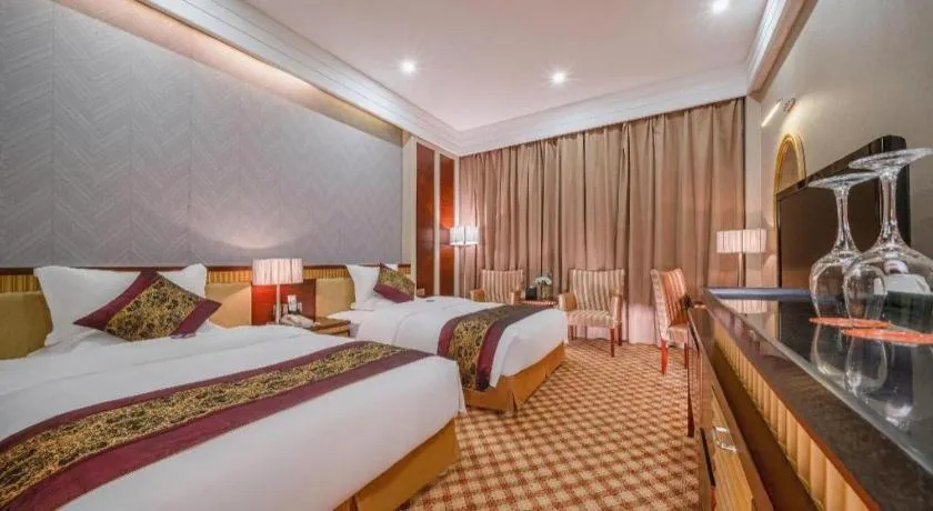 Bed in Nanning Yongjiang Hotel