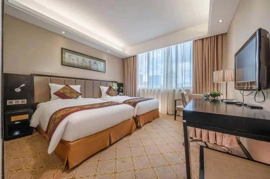 Bed in Nanning Yongjiang Hotel