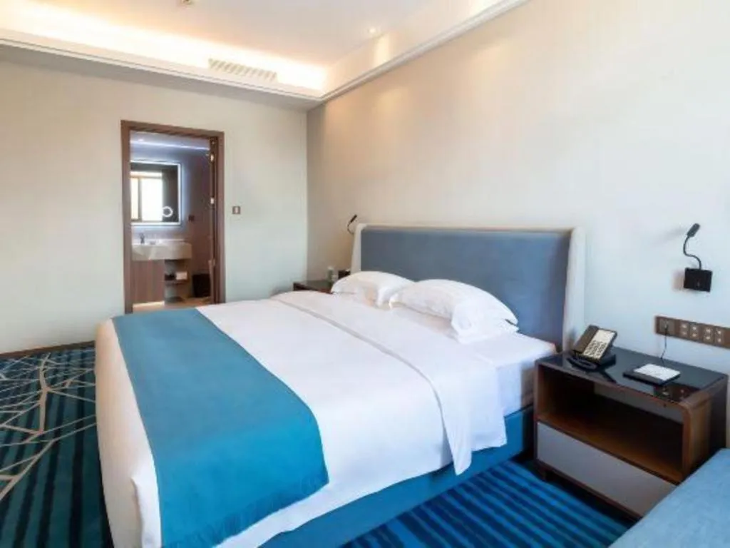 Bed in Nanning Yongjiang Hotel