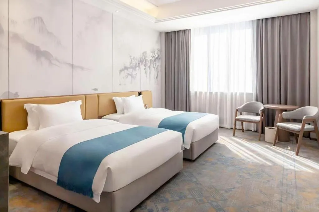 Bed in Nanning Yongjiang Hotel