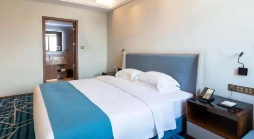 Bed in Nanning Yongjiang Hotel