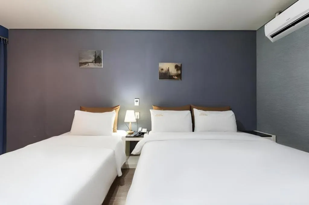 Bed in BENIKEA Technovalley Hotel