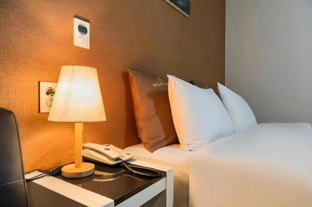 Bed in BENIKEA Technovalley Hotel