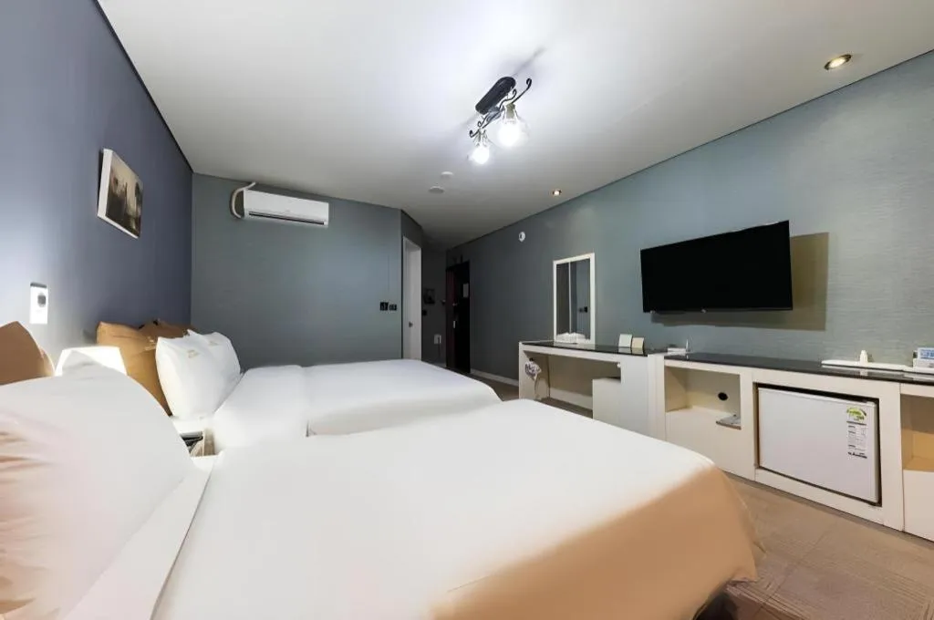 Bed in BENIKEA Technovalley Hotel