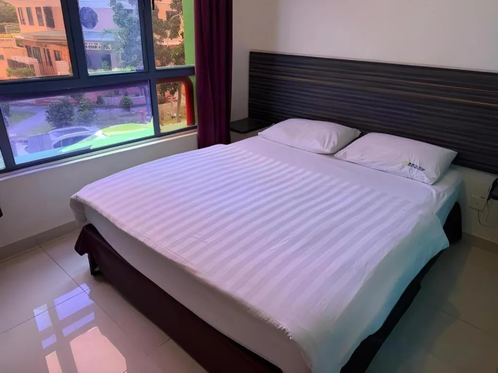 Bed in Darlene Hotel