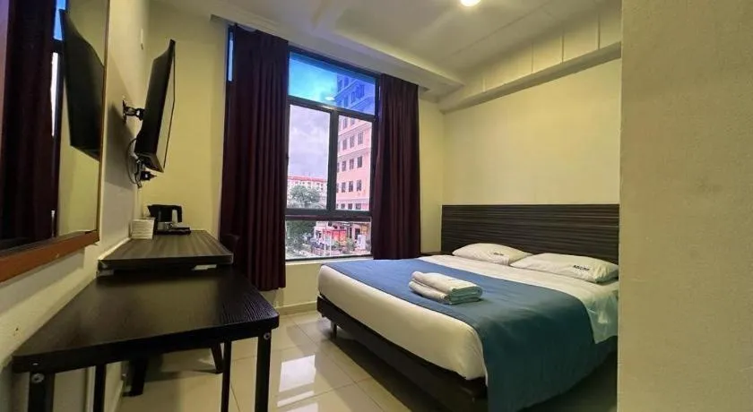 Bed in Darlene Hotel