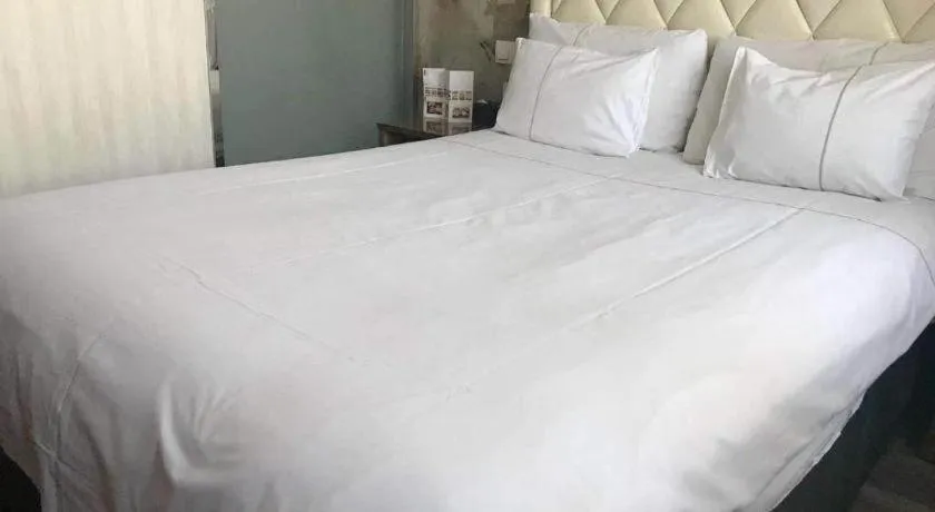 Bed in Nanjing Grand Da Qiao Hotel