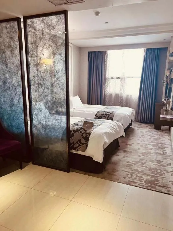 Bed in Nanjing Grand Da Qiao Hotel