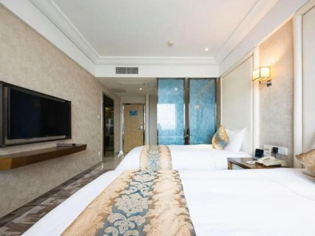 Bed in Nanjing Grand Da Qiao Hotel