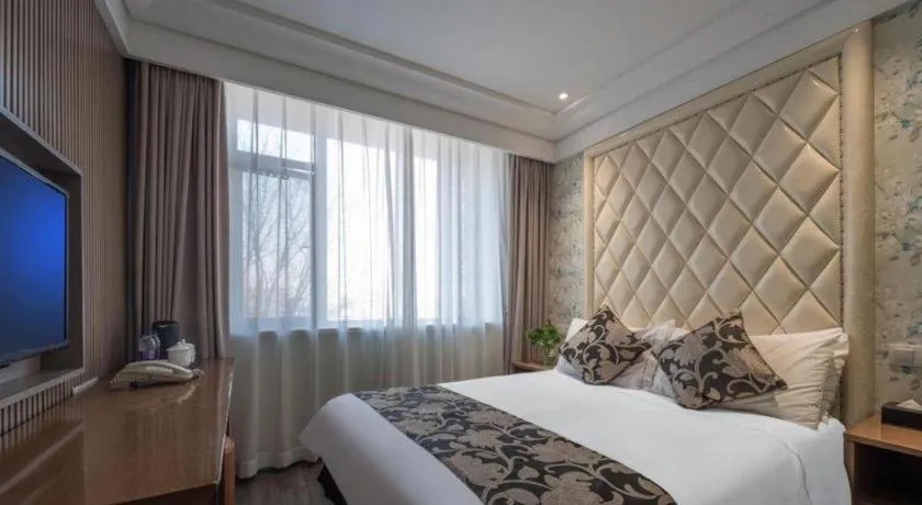 Bed in Nanjing Grand Da Qiao Hotel