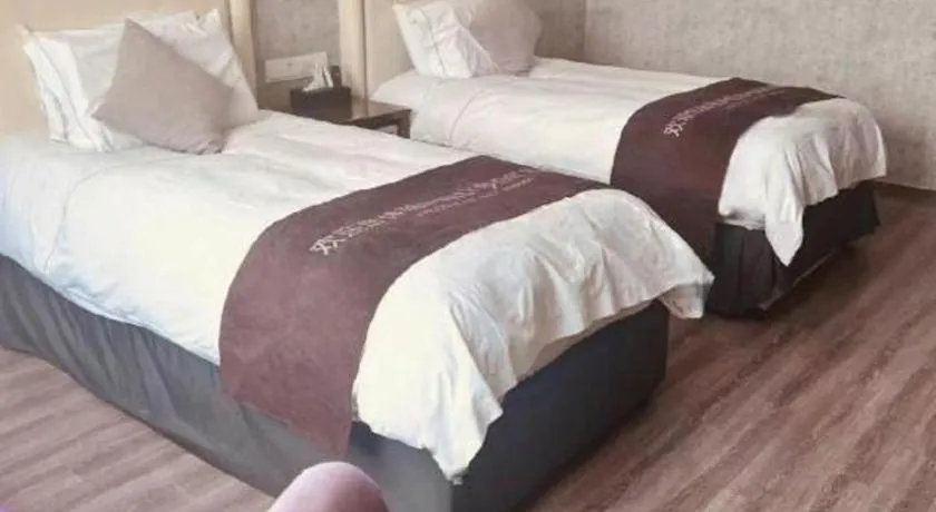 Bed in Nanjing Grand Da Qiao Hotel