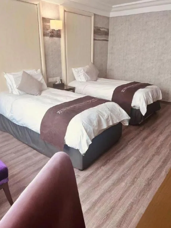 Bed in Nanjing Grand Da Qiao Hotel