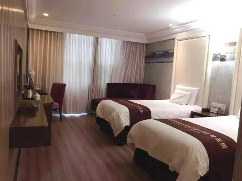 Bed in Nanjing Grand Da Qiao Hotel