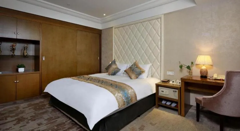 Bed in Nanjing Grand Da Qiao Hotel