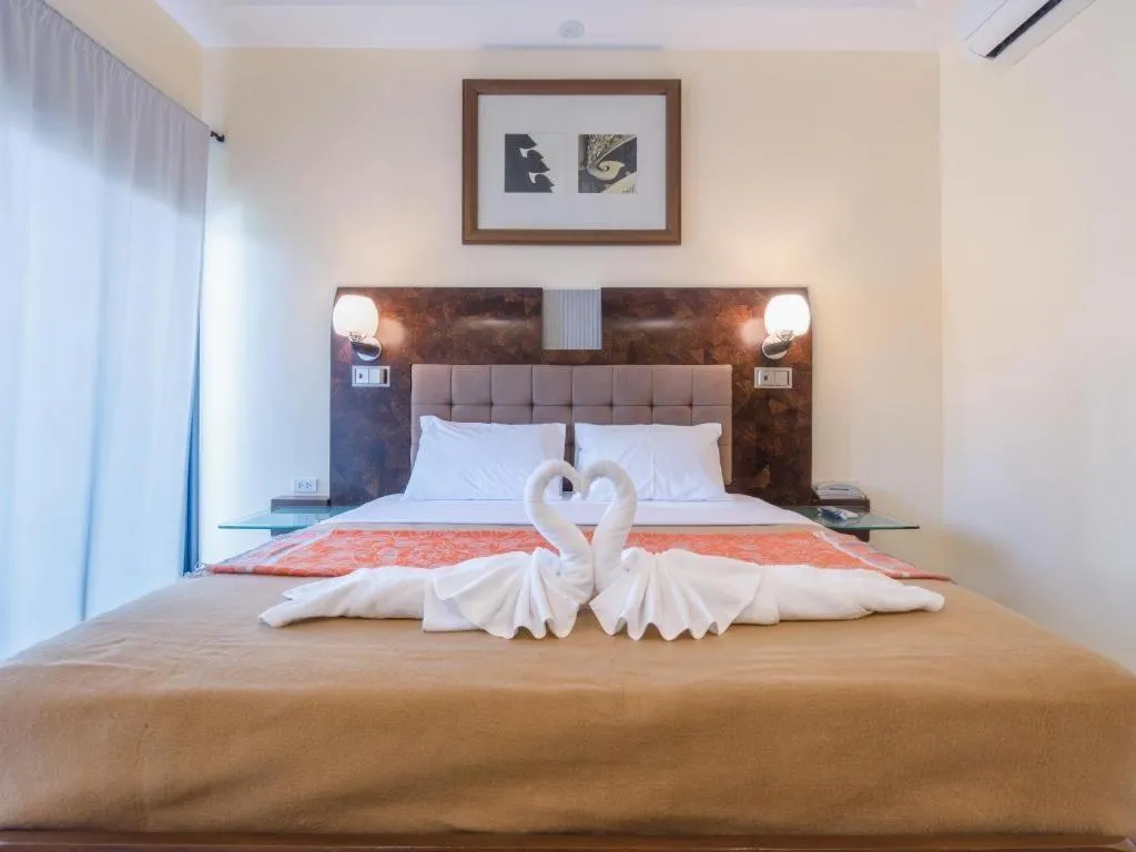 Bed in Lotusland Resort