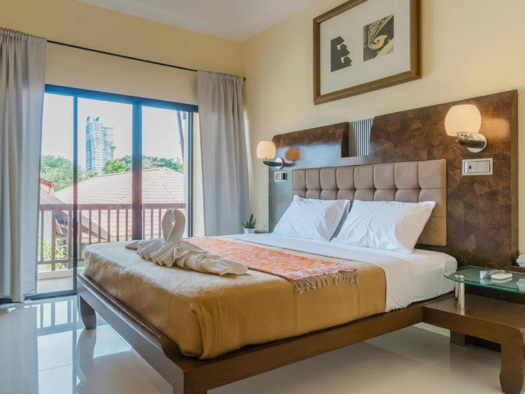 Bed in Lotusland Resort