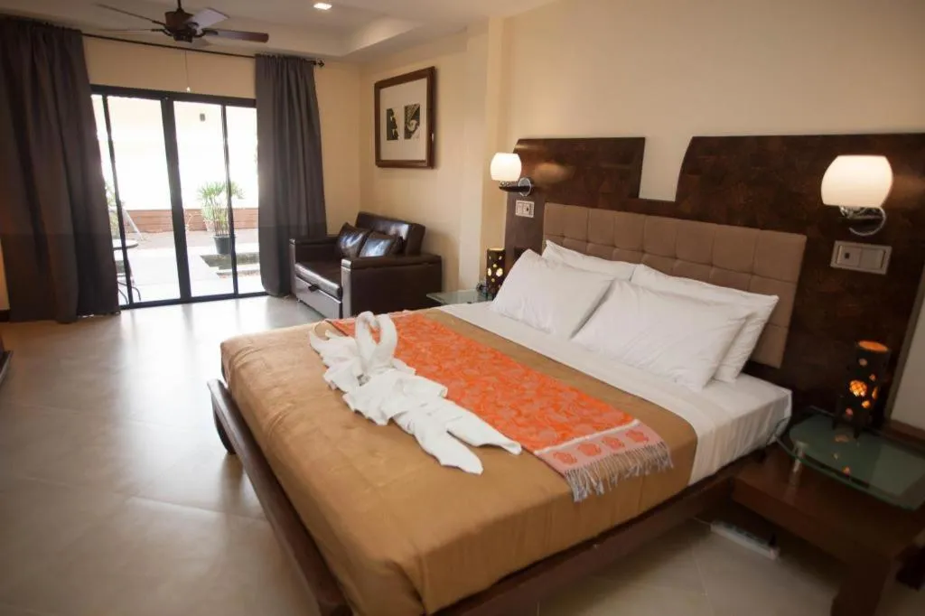 Bed in Lotusland Resort