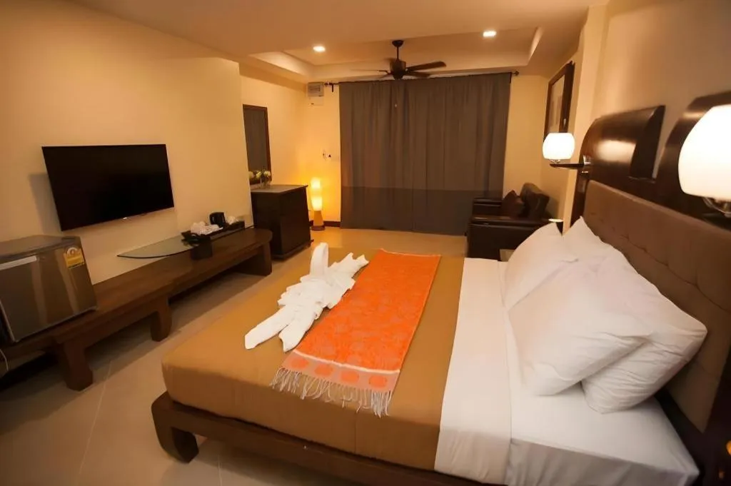 Bed in Lotusland Resort