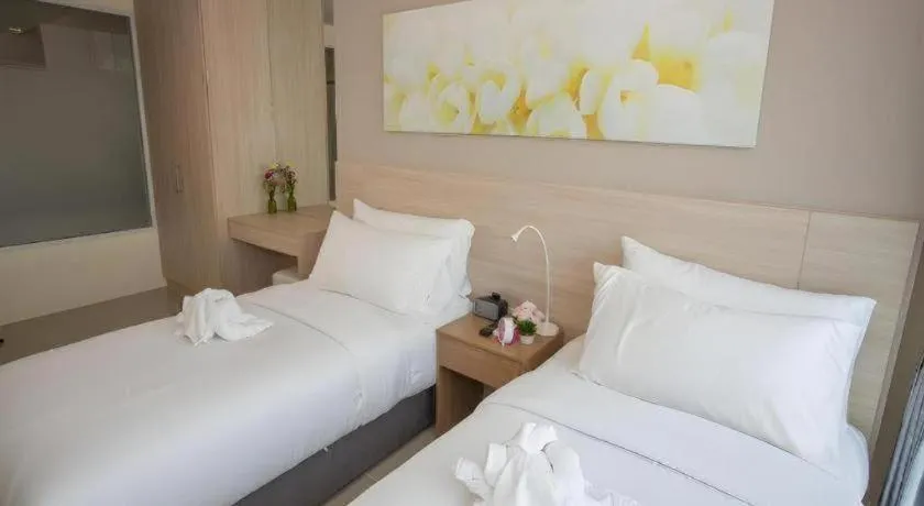 Bed in R-Con Hotel @ Siam