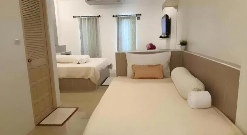 Bed in Saraburi Garden Resort