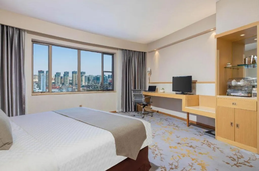 Bed in Kunming Jinjiang Hotel