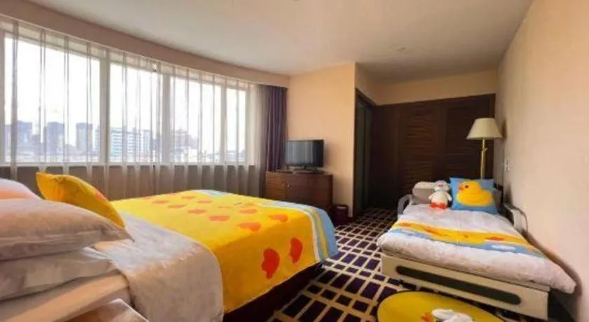 Bed in Kunming Jinjiang Hotel