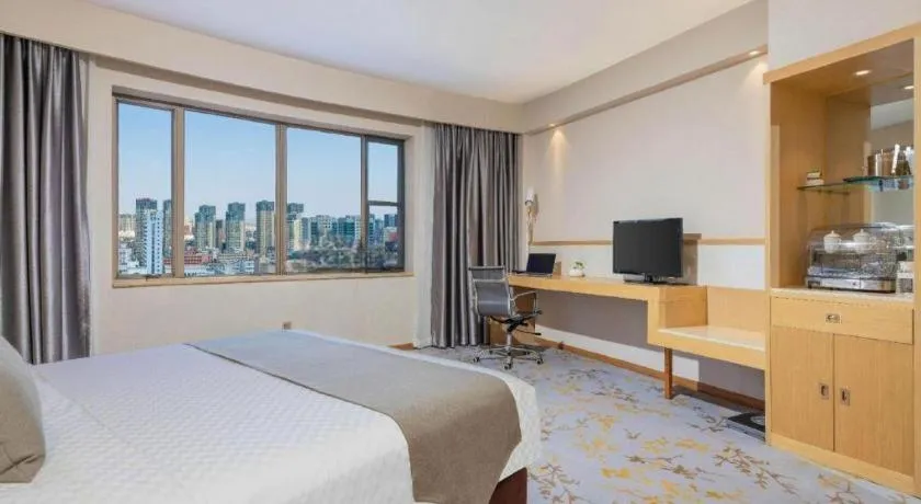 Bed in Kunming Jinjiang Hotel