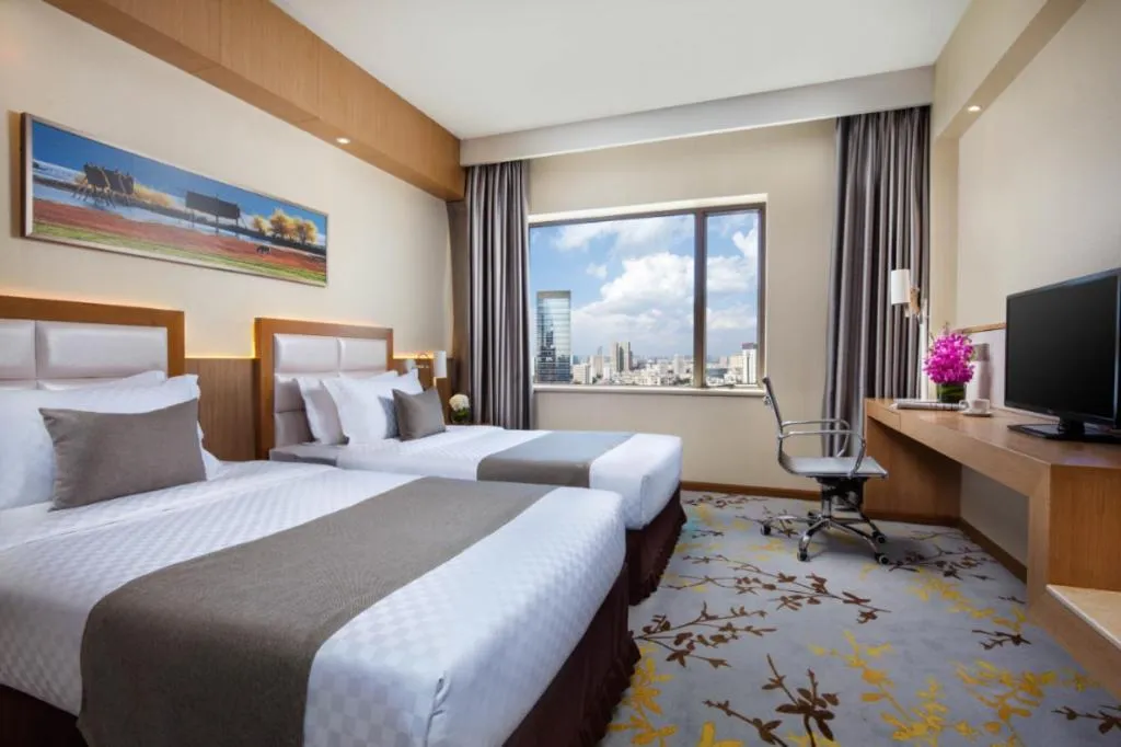 Bed in Kunming Jinjiang Hotel