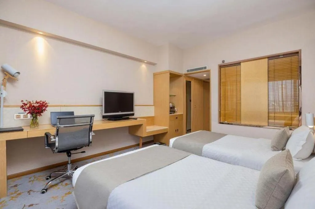 Bed in Kunming Jinjiang Hotel