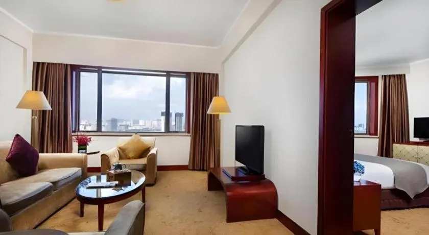 Bed in Kunming Jinjiang Hotel