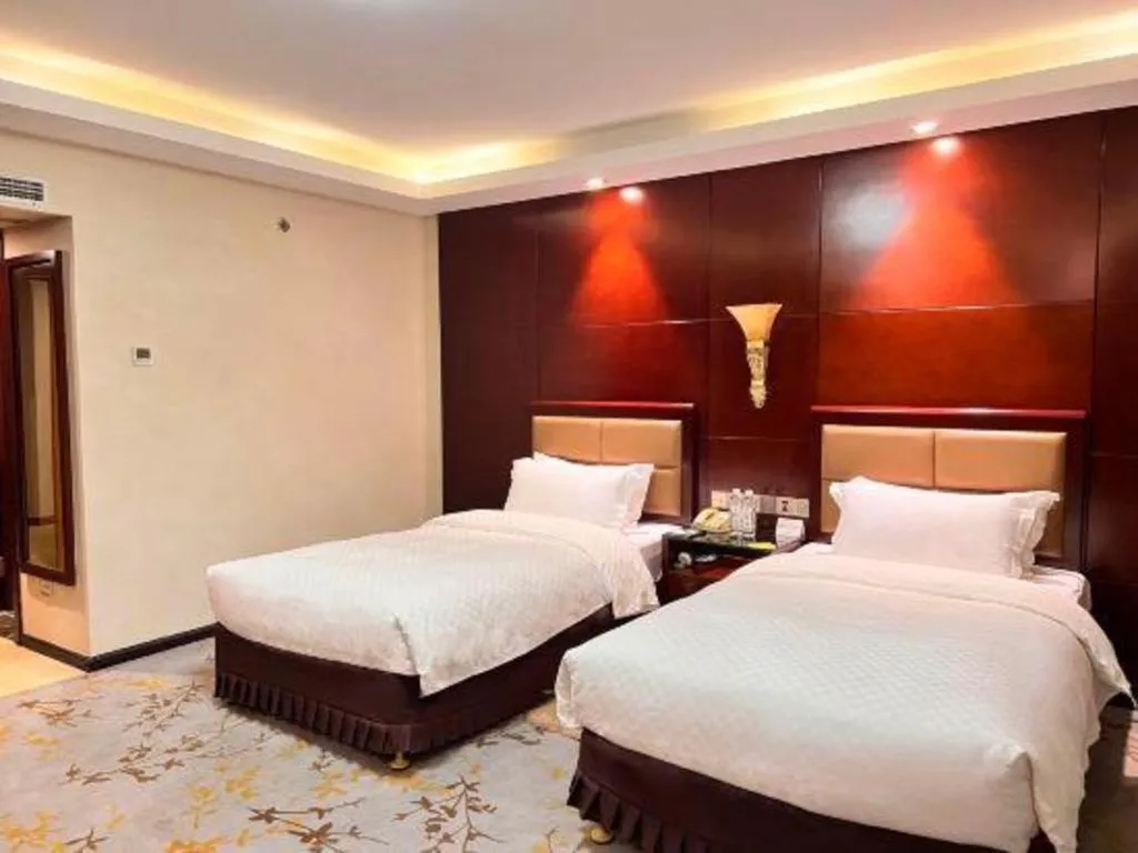 Bed in Kunming Jinjiang Hotel
