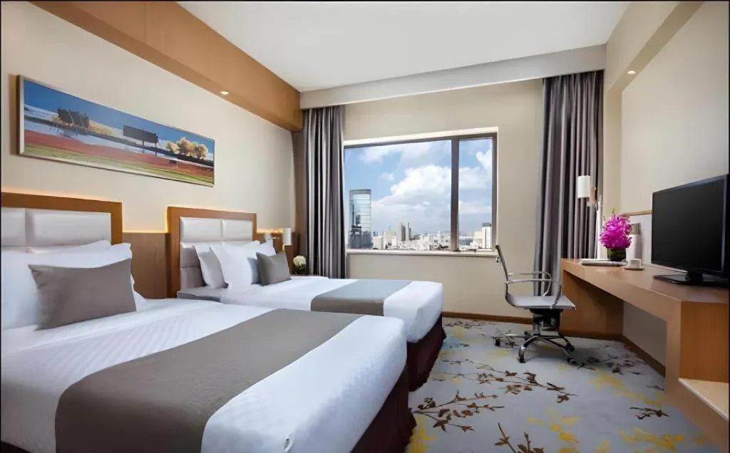 Bed in Kunming Jinjiang Hotel